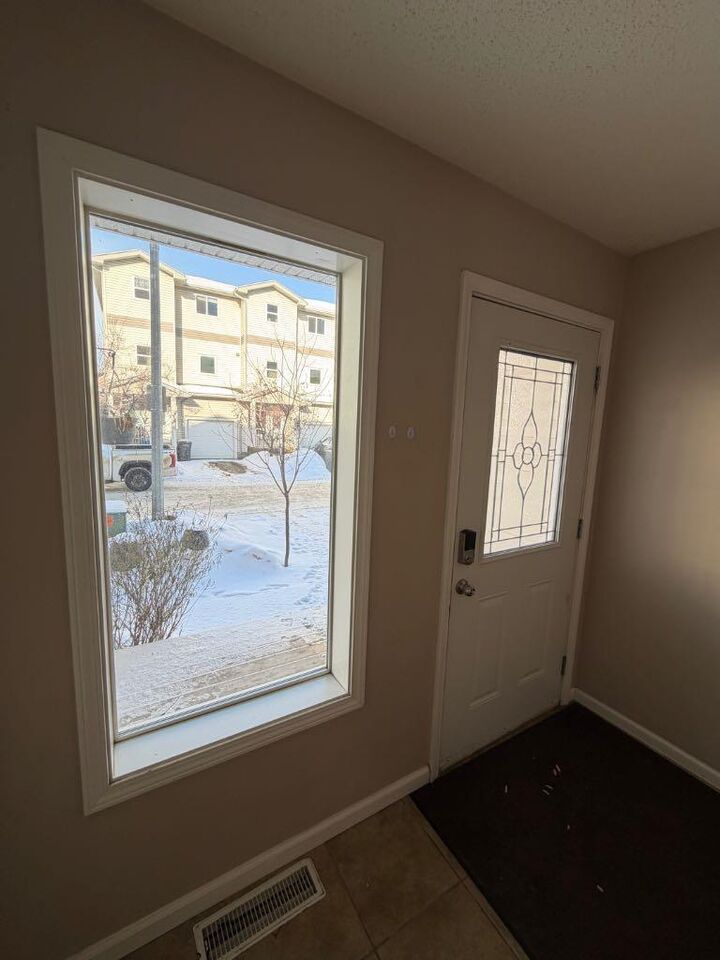 Property Photo:  313 Millennium Drive 84  AB T9K 0M2 