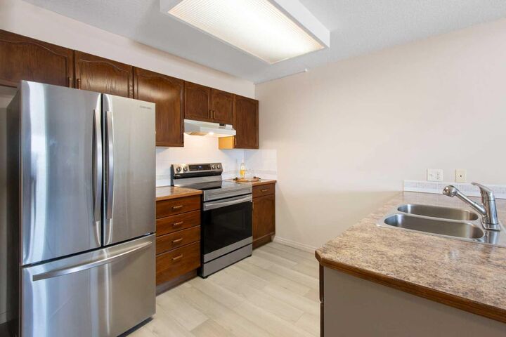 Property Photo:  3 Parklane Way 210  AB T1P 1N6 
