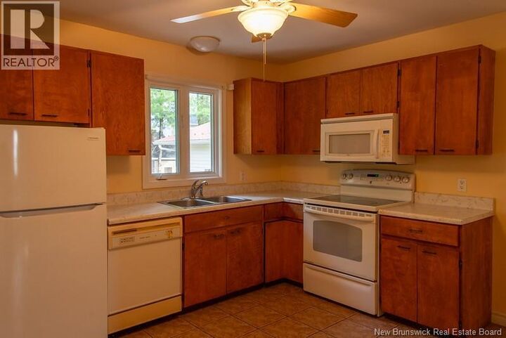 Property Photo:  72 Hartt Street  NB E3A 4X8 