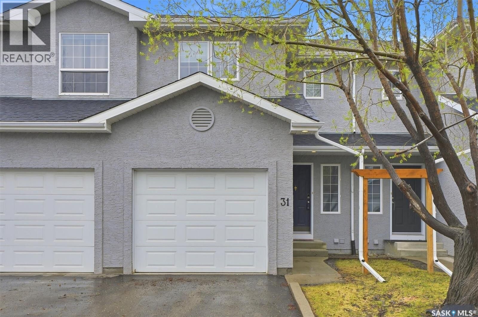 Property Photo:  31 425 Bayfield Crescent  SK S7V 1E6 