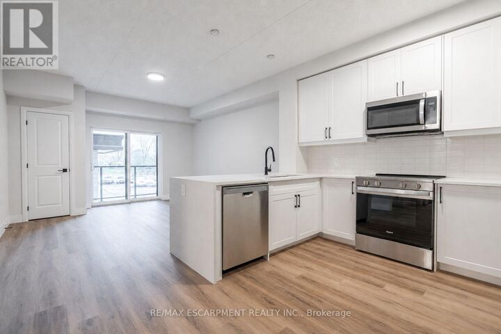 Property Photo:  6415 Regional Road 25 201  ON L9T 8R2 