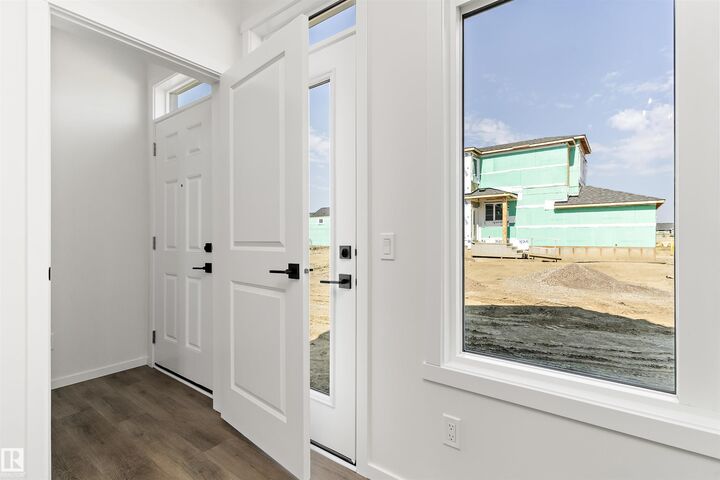 Property Photo:  2382 Muckleplum Way SW  AB T6X 3K1 