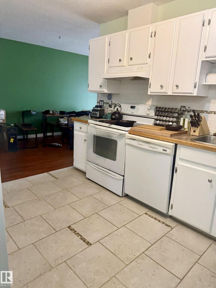 Property Photo:  202 22 Street  AB T9M 1E8 