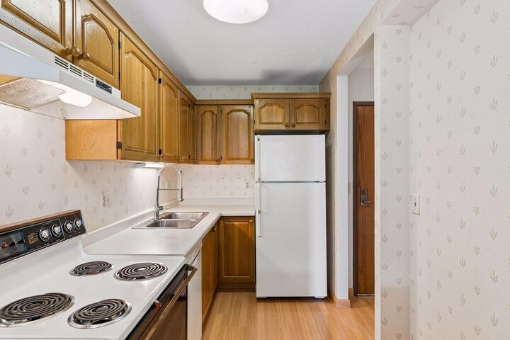 Property Photo:  1425 W 28th Street 315  MN 55408 