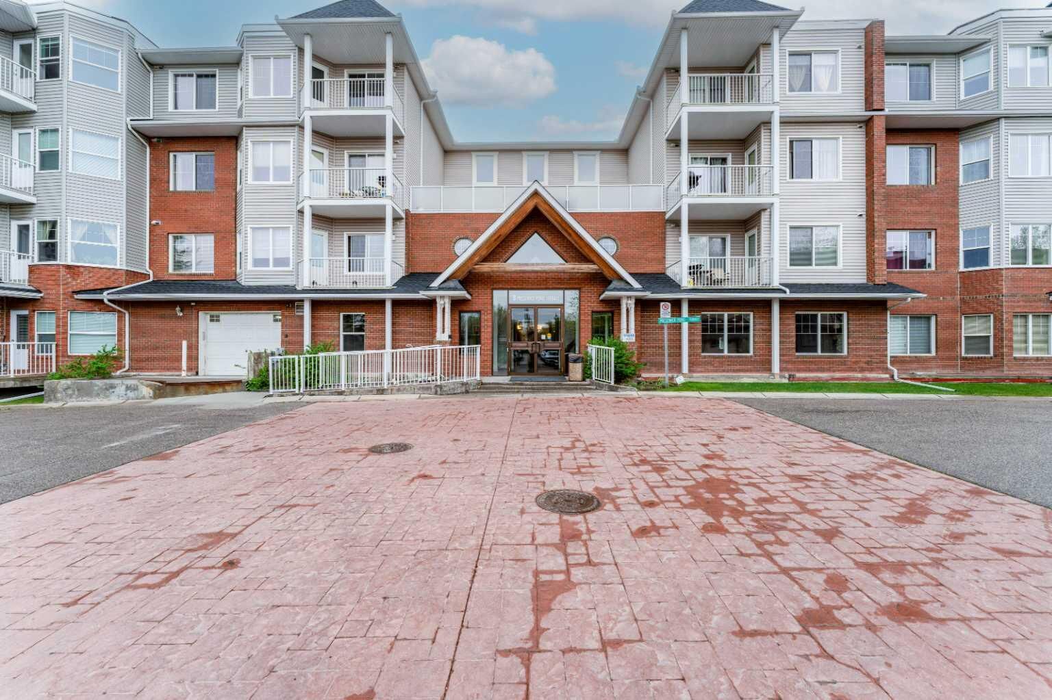 Property Photo:  8 Prestwick Pond Terrace SE 206  AB T2Z 4P3 