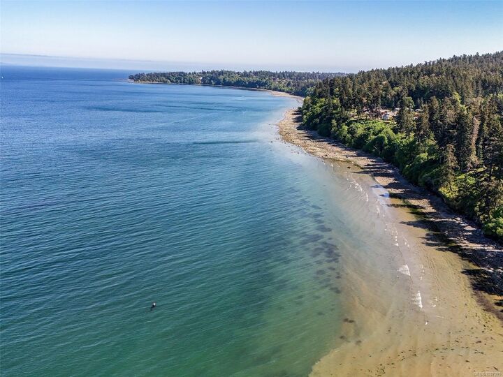 Property Photo:  4771 Cordova Bay Rd 1  BC V8Y 2J7 
