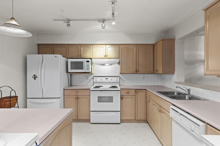 Property Photo:  2575 Ware Street 208  BC V2S 3E2 