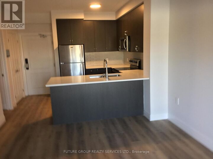 Property Photo:  6415 Regional Rd 25 203  ON L9T 2W3 