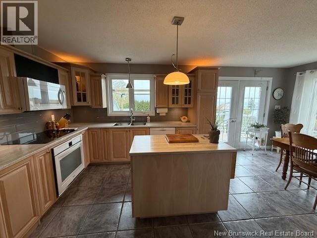 Property Photo:  469 Chaleur Street  NB E8E 2C1 