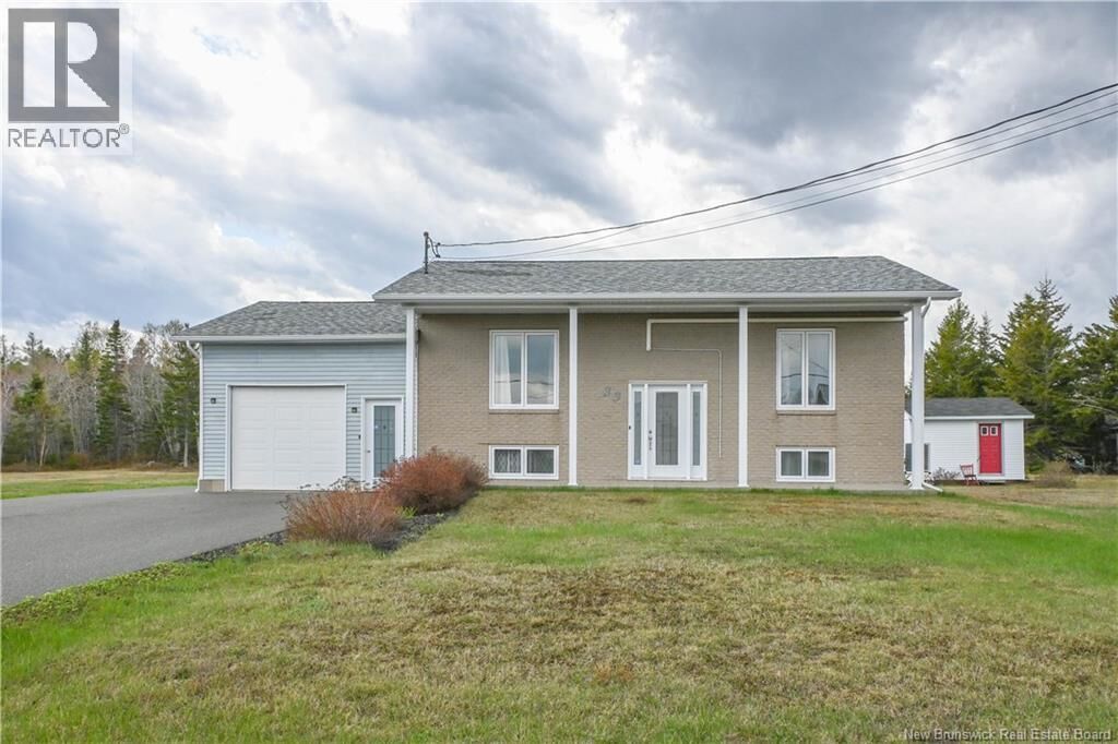 Property Photo:  33 De La Baie Street  NB E8N 2A9 