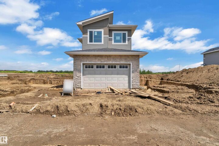 Property Photo: 1129 Starling Drive NW AB T5S 0V4