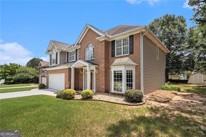 Property Photo:  1900 Green Oak Circle  GA 30043 