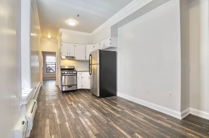 Property Photo:  6311 Dewey Ave 2  NJ 07093 