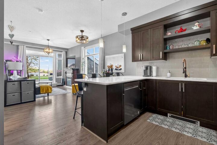 Property Photo:  6603 New Brighton Avenue SE 105  AB T2Z 5E5 