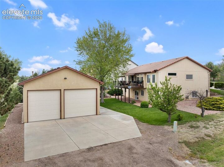 Property Photo:  10000 Rolling Ridge Road  CO 80925 