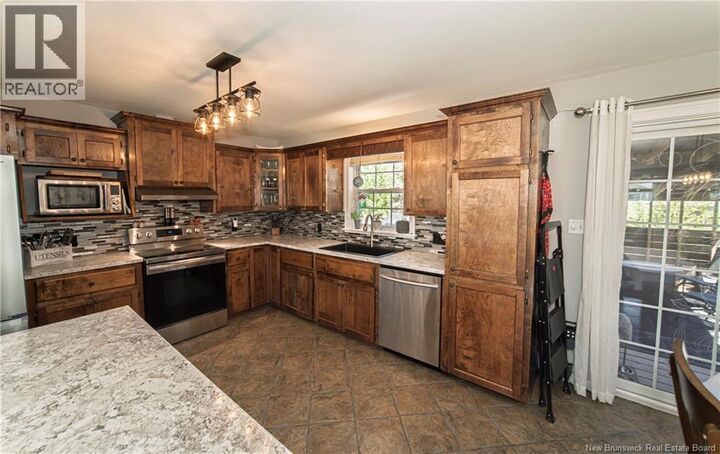 Property Photo: 40 Dawson Drive NB E2V 0B8