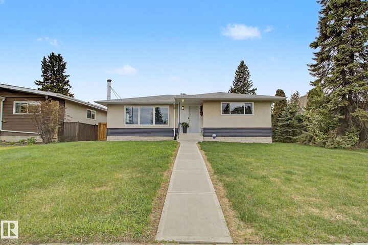 Property Photo: 3748 117 Street NW AB T6J 1S7