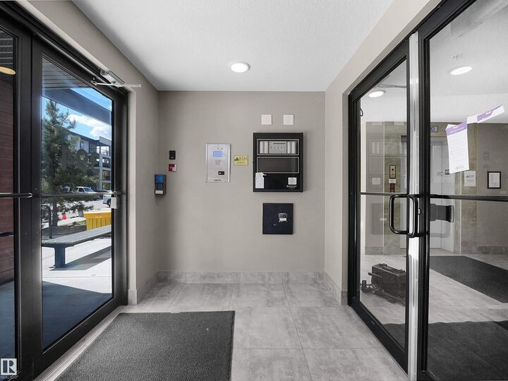 Property Photo: 394 Windermere Road NW 210 AB T6W 0R1