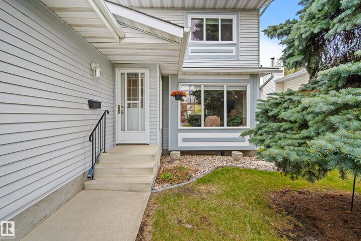 Property Photo: 4 Wild Rose Place AB T8H 1H1