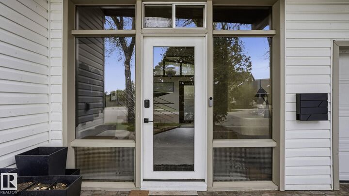 Property Photo:  6412 Ada Boulevard NW  AB T5W 4P2 