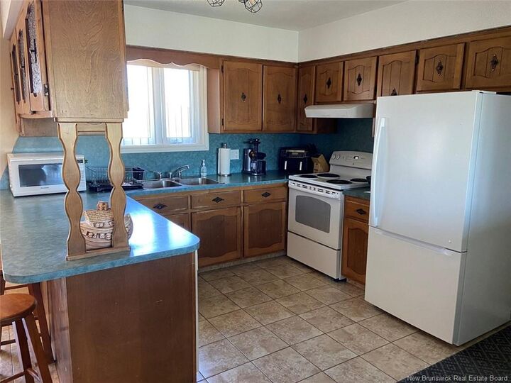 Property Photo: 20 Sirois Road NB E7E 1H9