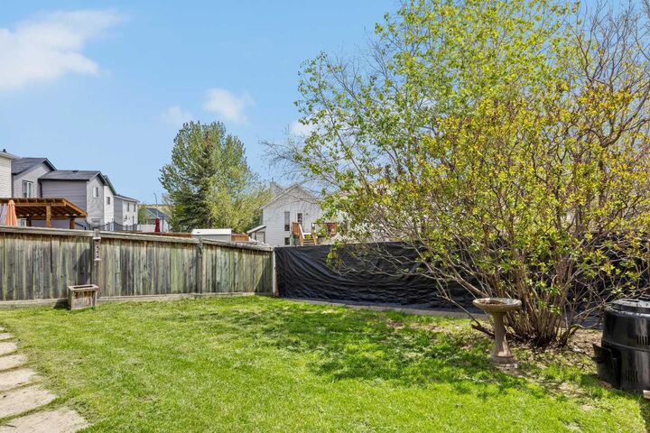 Property Photo:  242 Hidden Spring Mews NW  AB T3A 5N3 