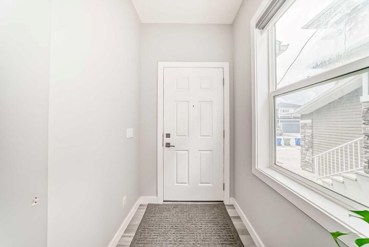 Property Photo:  123 Red Sky Crescent NE  AB T3N 1R2 
