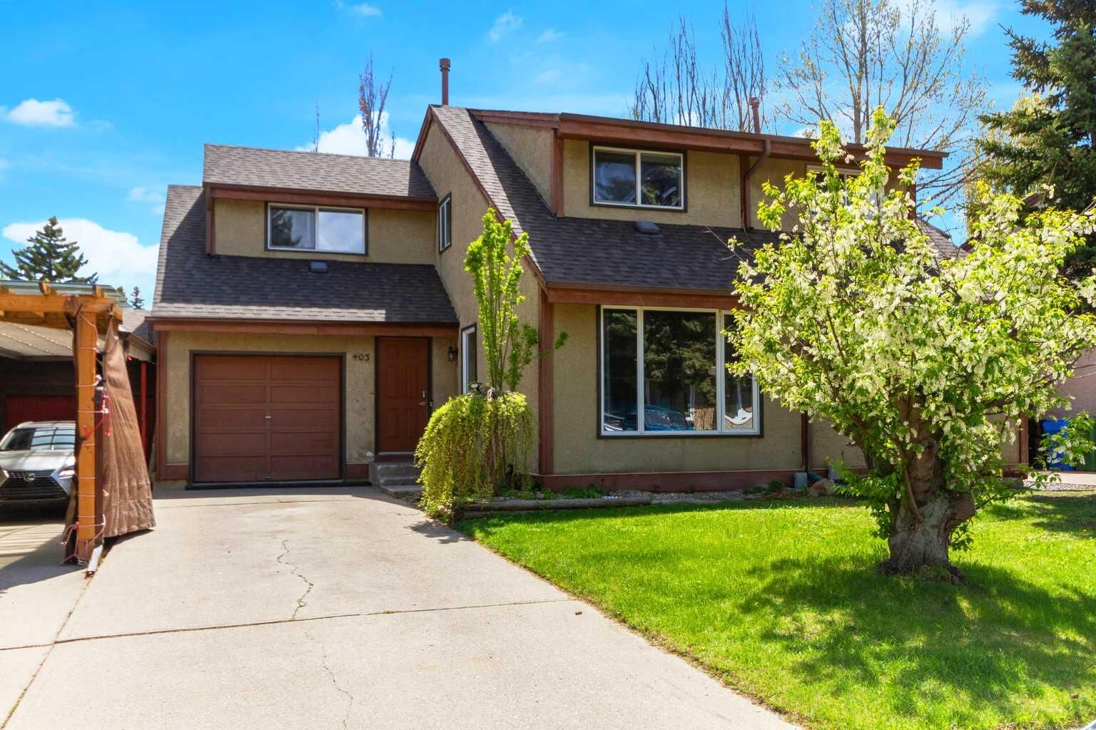 Property Photo: 403 Cannington Close SW AB T2W 3E9