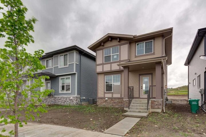 Property Photo: 422 Heartland Way AB T4C 3E5