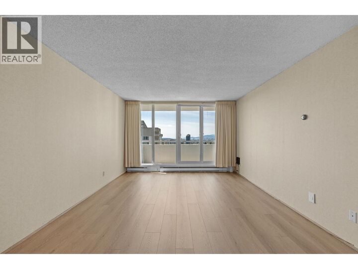 Property Photo:  5645 Barker Avenue 2001  BC V5H 3Z5 