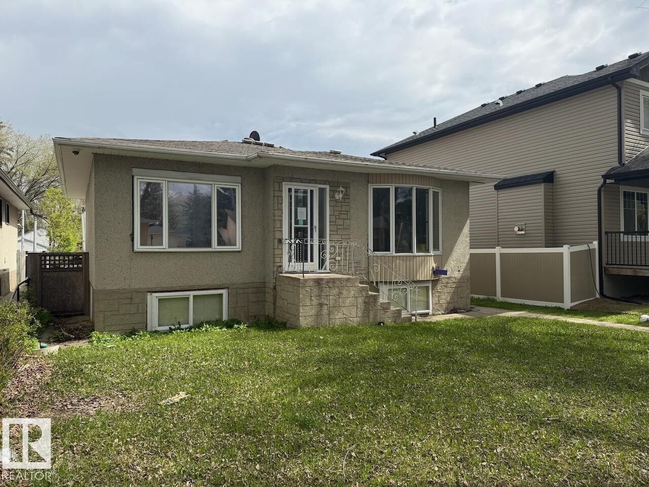 Property Photo:  11839 56 Street NW  AB T5W 3S7 