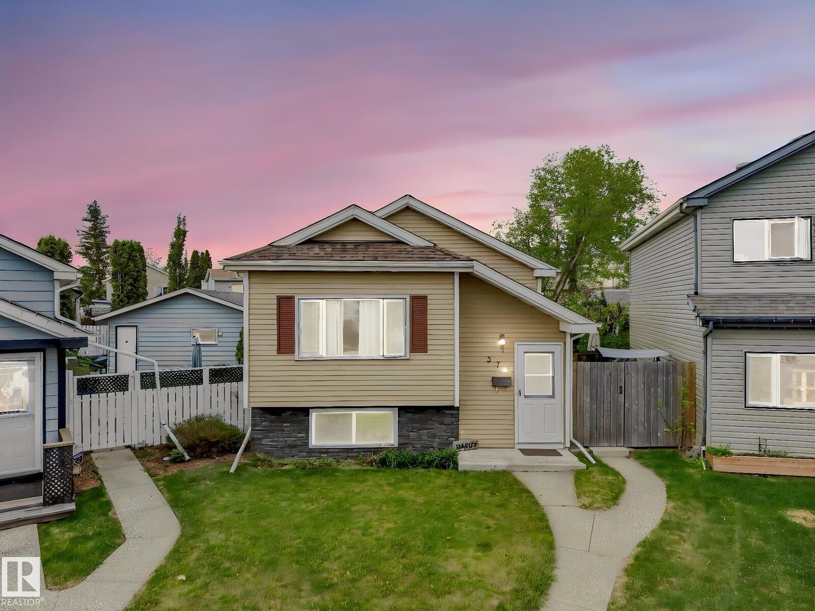 Property Photo: 373 Kirkpatrick Crescent NW AB T6L 5C9