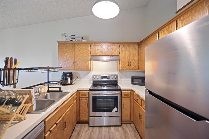 Property Photo:  14831 Endicott Way 316  MN 55124 
