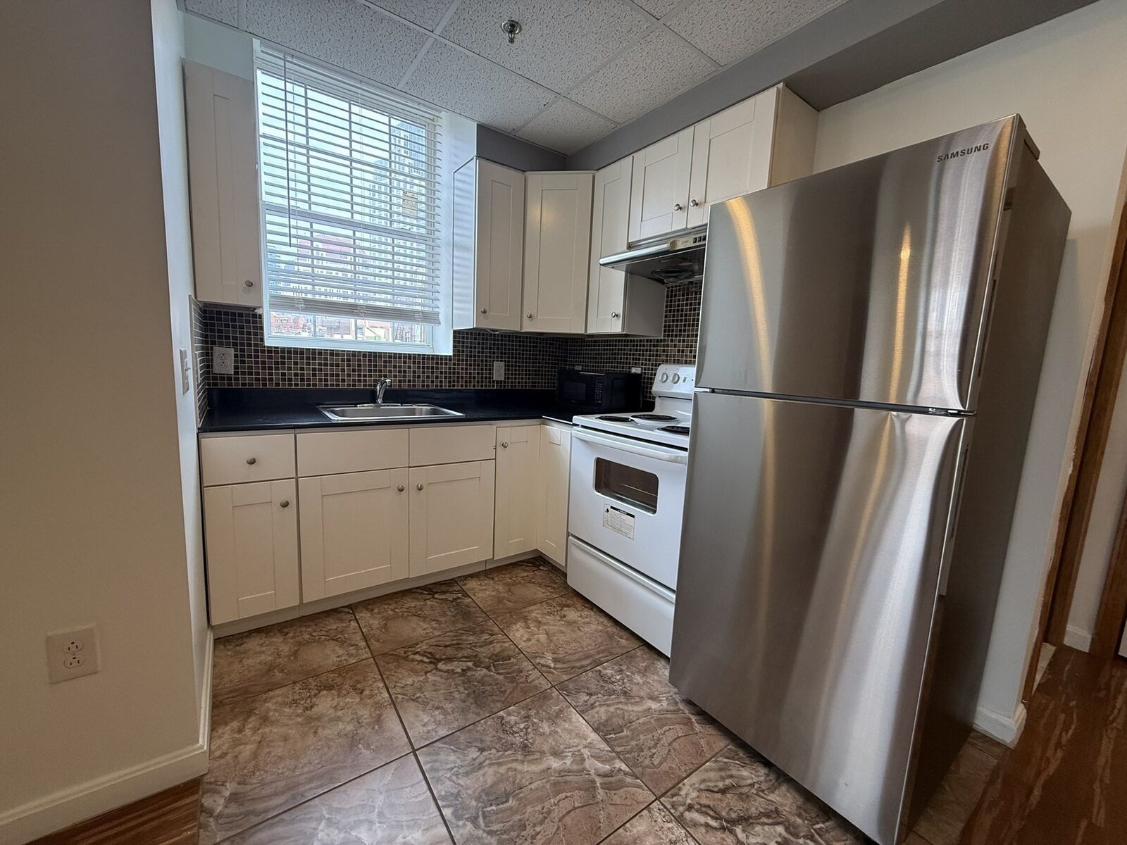 Property Photo:  72 Kneeland 503  MA 02111 