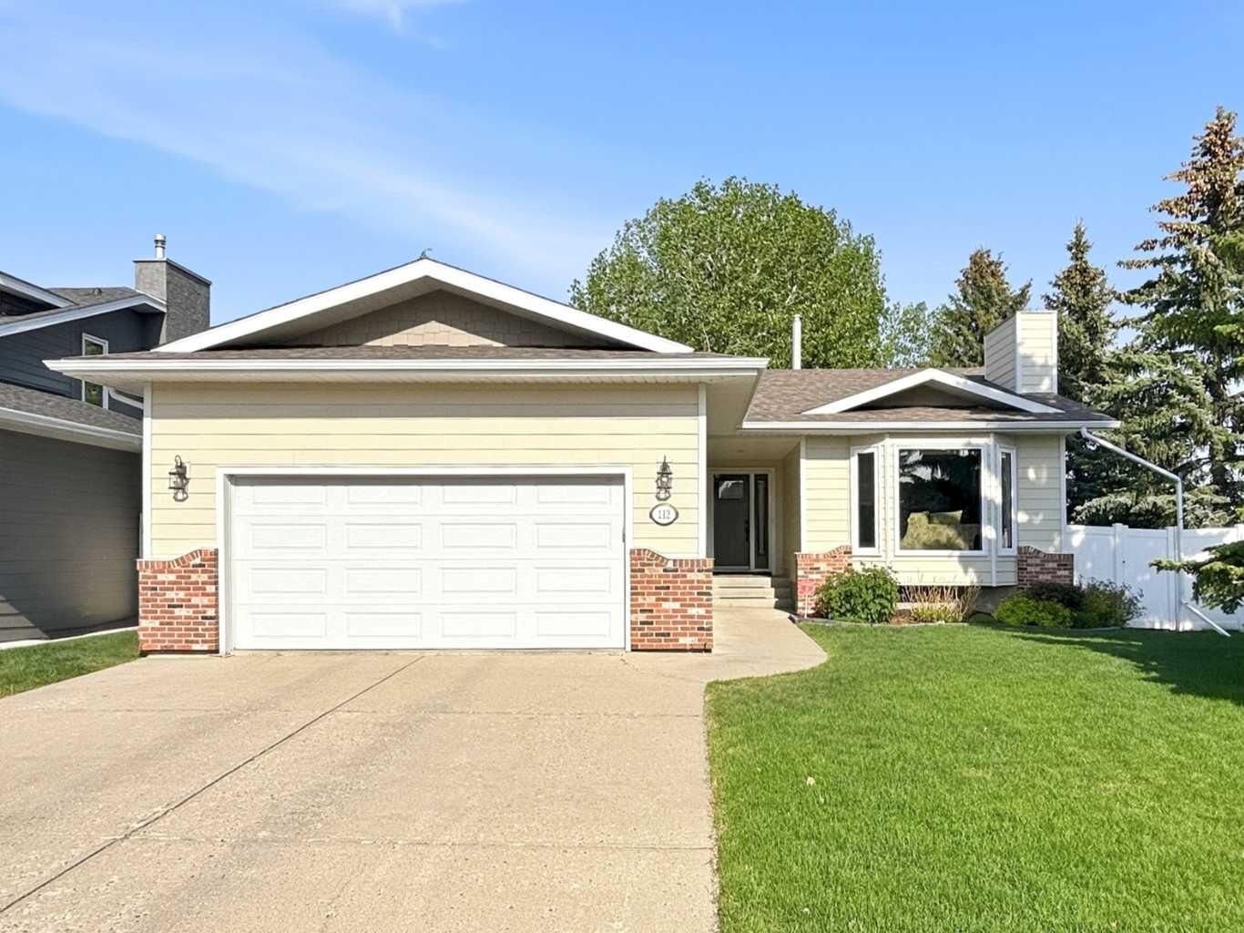 Property Photo: 112 Denison Crescent AB T4R 2G1