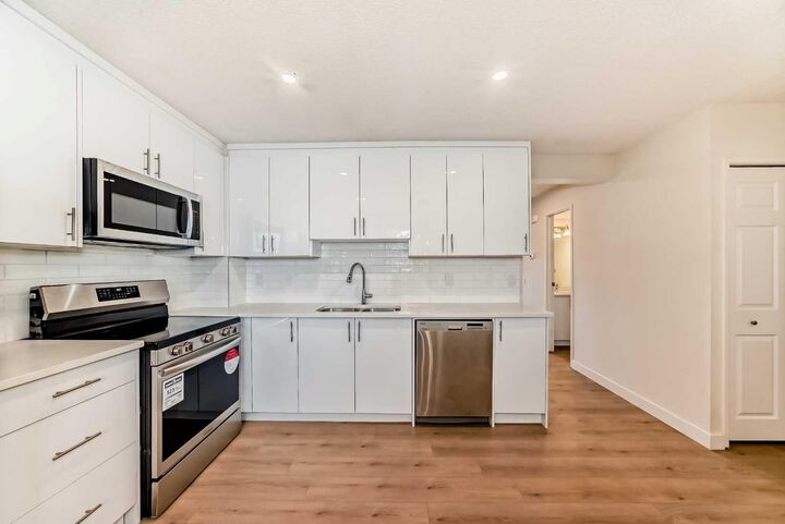 Property Photo: 1515 Falconridge Drive NE 32 AB T3J 1J8