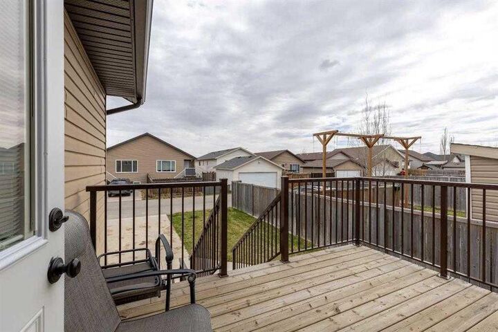 Property Photo:  139 Mt Sundial Court W Main Floor  AB T1J 5B7 
