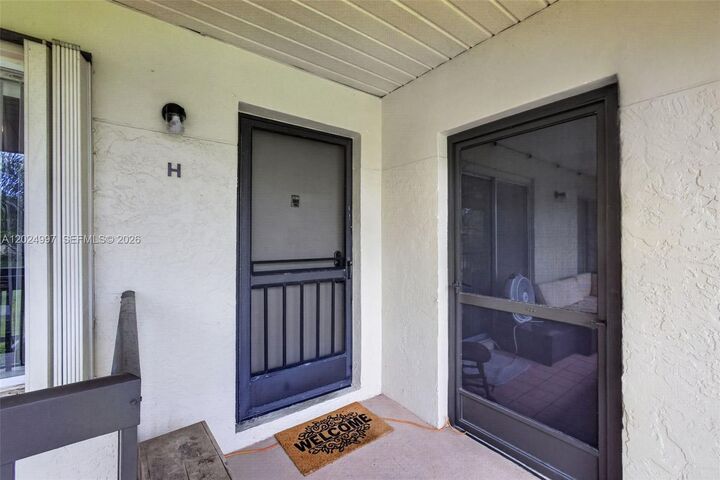 Property Photo: 6555 Chasewood Dr H FL 33458