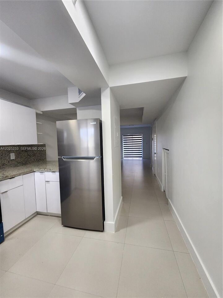Property Photo:  7785 W 30th Ct F-203  FL 33018 