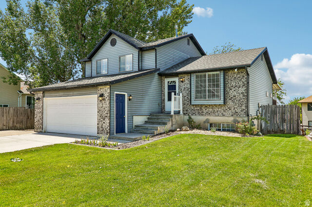Property Photo: 1115 W 2600 N UT 84041