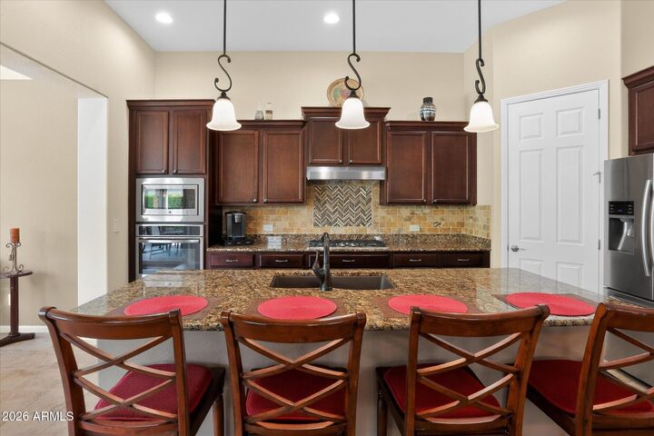 Property Photo: 16714 W Alvarado Drive AZ 85395