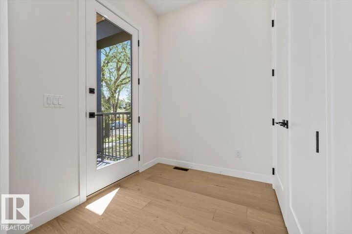 Property Photo:  10932 132 Street NW  AB T5M 1C9 