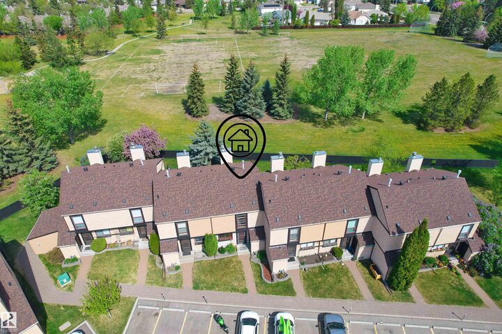 Property Photo: 12128 25 Avenue NW AB T6J 4L4