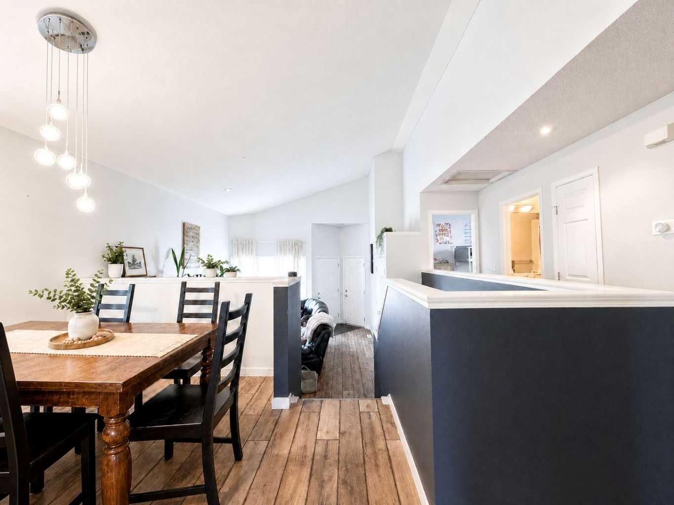 Property Photo: 129 Cimarron Grove Circle AB T1S 2M1