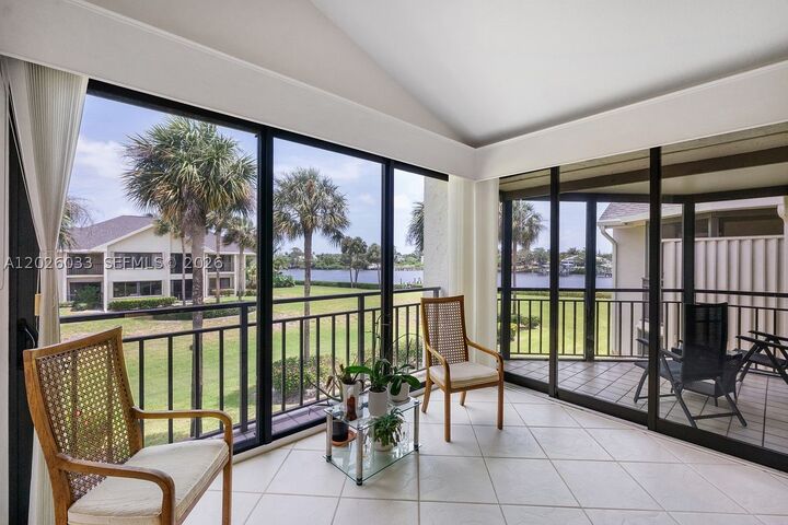 Property Photo:  10411 SE Terrapin Place 203  FL 33469 