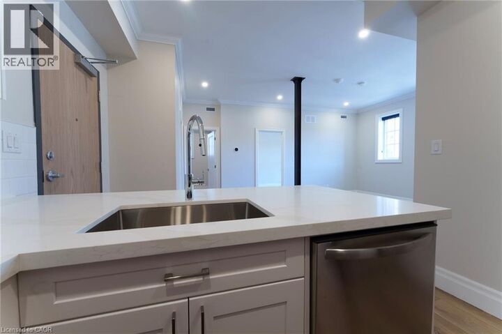 Property Photo:  100 Charlton Avenue West 203  ON L8P 2C3 