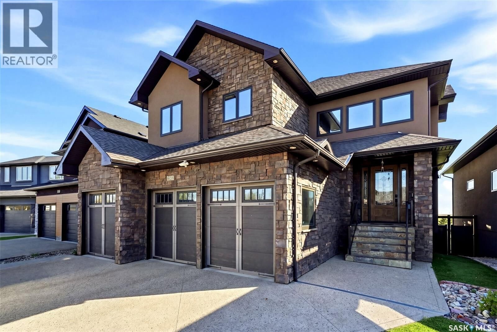 Property Photo:  7502 Lilac Place  SK S4Y 0B3 