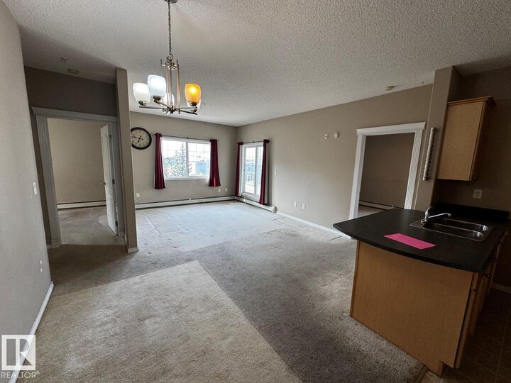 Property Photo: 16715 100 Avenue NW 300 AB T5P 4Z5