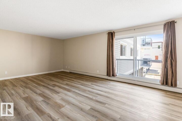 Property Photo: 10815 83 Avenue NW 202 AB T6E 2E6