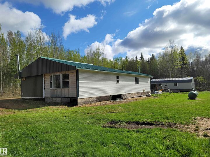 Property Photo: 624072 Rge Road 241 AB T0G 1Z0